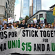 Fast-food workers, health care workers and their supporters shout slogans during a rally and march in Los Angeles Dec. 4, 2014, to demand an increase of the minimum wage to $15 per hour.
Robyn Beck/Getty Images